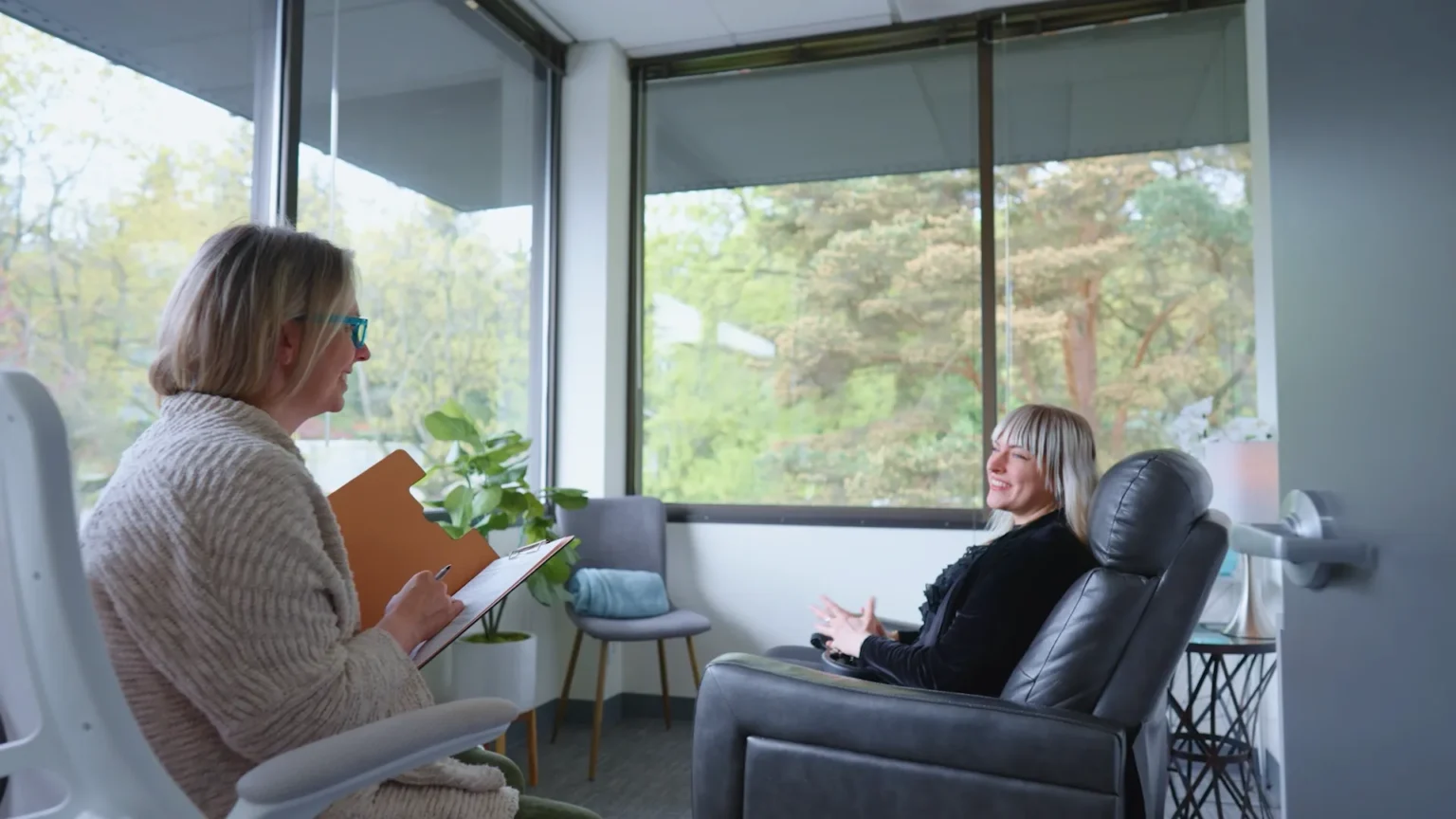 Provider listening to a patient during a medication management visit
